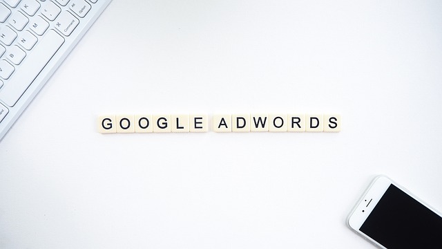 “Google Adwords” written in scrabble tiles.